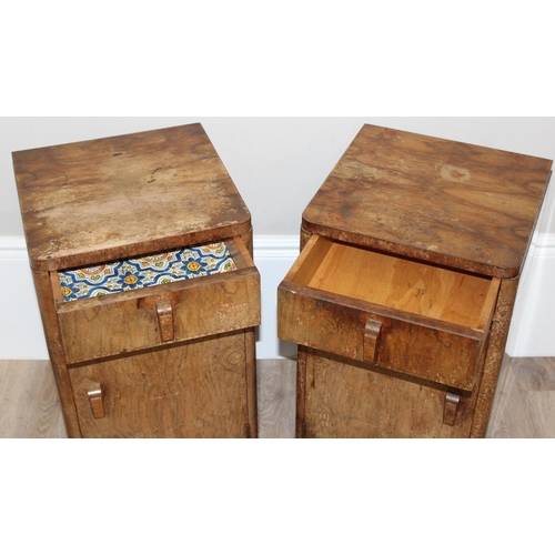 103 - A pair of Art Deco period burr walnut bedside cabinets, a single drawer over a cupboard base, each a... 