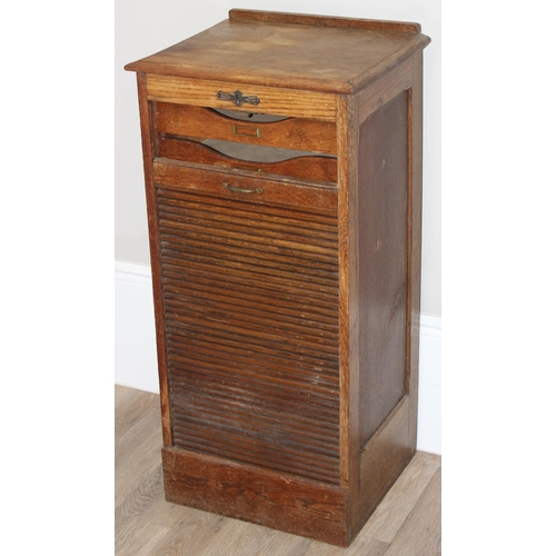 86 - A vintage oak tambour fronted drawer cabinet, approx 48cm wide x 41cm deep x 102cm tall