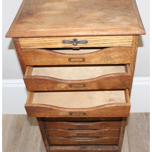 86 - A vintage oak tambour fronted drawer cabinet, approx 48cm wide x 41cm deep x 102cm tall