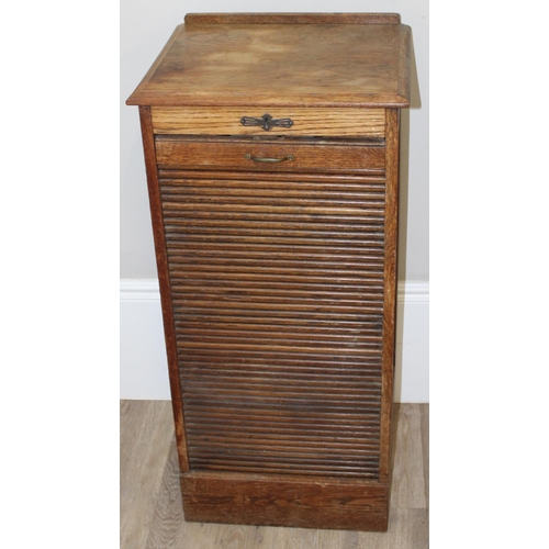 86 - A vintage oak tambour fronted drawer cabinet, approx 48cm wide x 41cm deep x 102cm tall