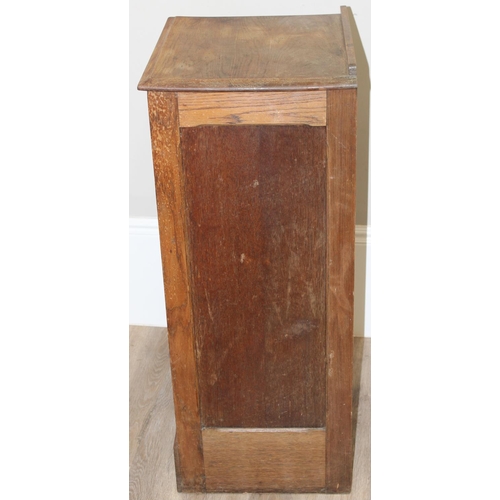 86 - A vintage oak tambour fronted drawer cabinet, approx 48cm wide x 41cm deep x 102cm tall