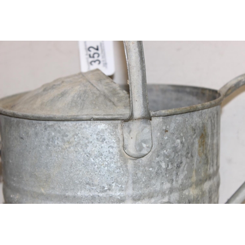 352 - 2 vintage galvanised watering cans, one 2 gallons and one smaller