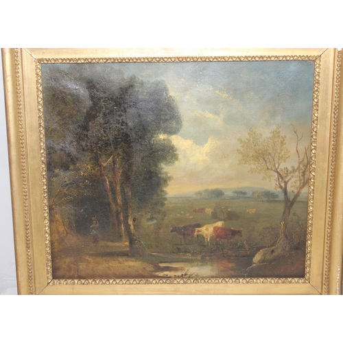 423 - A 19th century oil on canvas depicting cattle near a watering hole, unsigned, and an oil on board en... 