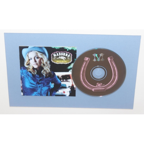 445 - Madonna, a signed promo card and CD display, presented in frame with COA verso, approx 69cm x 57cm i... 