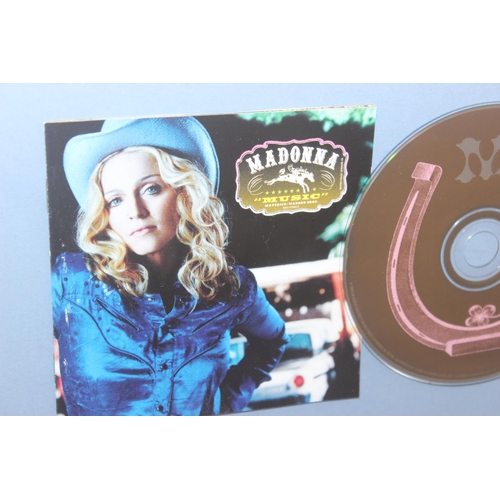 445 - Madonna, a signed promo card and CD display, presented in frame with COA verso, approx 69cm x 57cm i... 