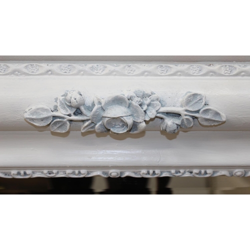 458 - Large white painted rectangular over mantel mirror with white painted floral decoration, approx 138c... 