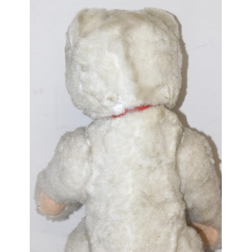 656 - 2 vintage teddy bears, one with growler and Foreign label, the larger approx 41cm tall