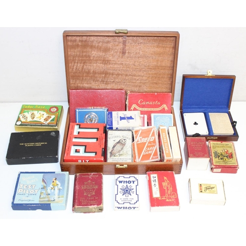 659 - Qty of vintage playing cards and card games in wooden box