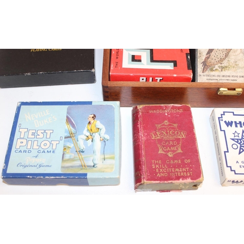 659 - Qty of vintage playing cards and card games in wooden box