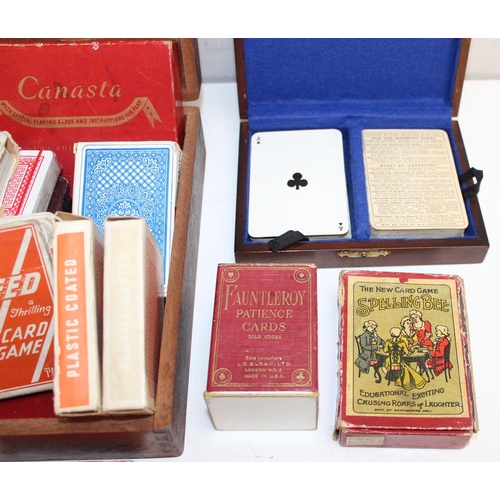 659 - Qty of vintage playing cards and card games in wooden box