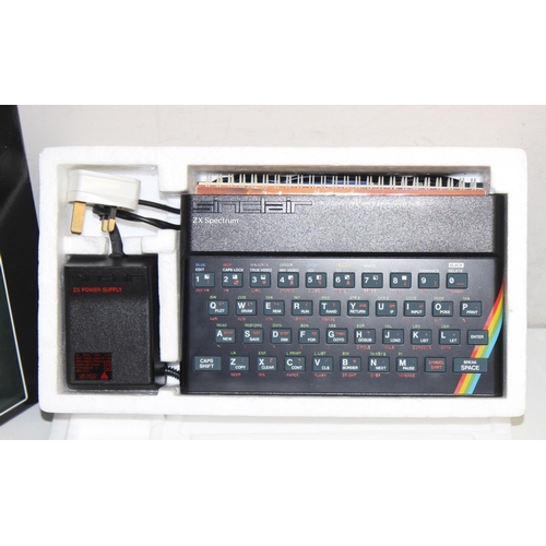 660 - Vintage Sinclair ZX Spectrum personal computer in original box with games to include Donkey Kong, Ti... 