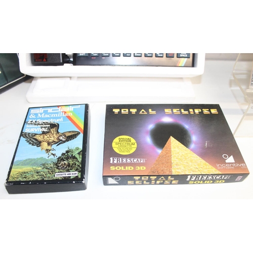 660 - Vintage Sinclair ZX Spectrum personal computer in original box with games to include Donkey Kong, Ti... 