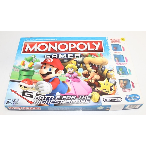 664 - Qty of Monopoly game variations to include Dino-opoly, Dual masters, Disney Edition, Roald Dahl and ... 