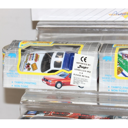 669 - Qty of assorted boxed toy vehicles to inc police cars etc (18)