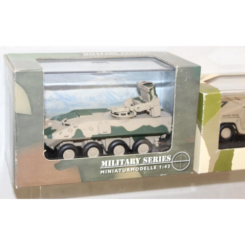 671 - 4 assorted boxed military vehicles to inc examples by Victoria