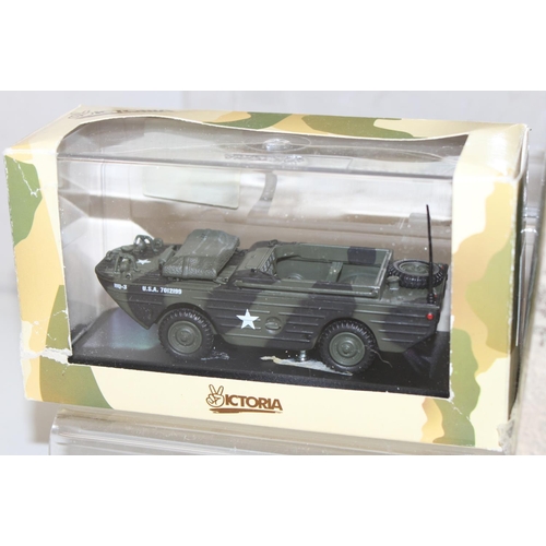 671 - 4 assorted boxed military vehicles to inc examples by Victoria