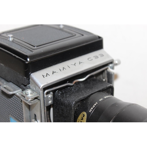 765 - Mamiya C33 camera in case with 2 lenses to inc a Mamiya Sekor 1:2.8 F=80mm & Mamiya Sekor 1:4.5 f=18... 