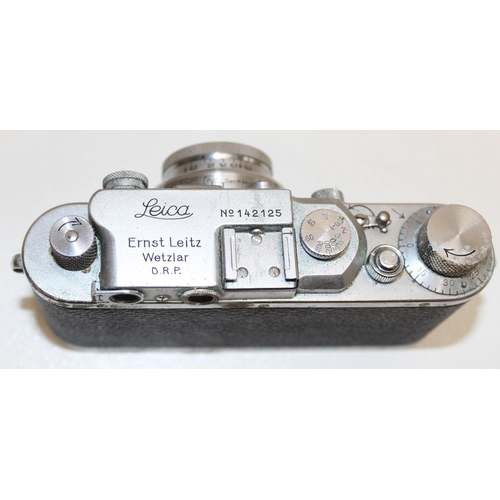 767 - A vintage Ernst Leitz Leica 3 camera in leather case, with Ernst Leitz Wetzlar Summar f=5mm 1:2 lens... 