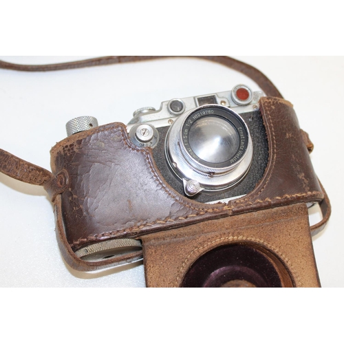 767 - A vintage Ernst Leitz Leica 3 camera in leather case, with Ernst Leitz Wetzlar Summar f=5mm 1:2 lens... 