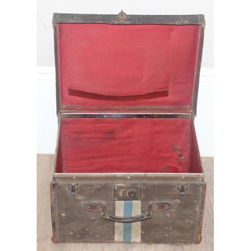 313 - 2 vintage trunks, one metal and one canvas with labels and 2 wicker baskets, the metal trunk approx ... 