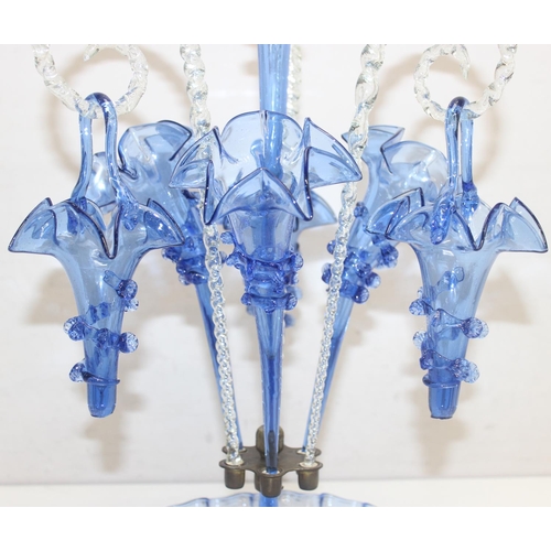 1573 - A large and impressive blue glass epergne, with a central trumpet over three smaller trumpets, all w... 