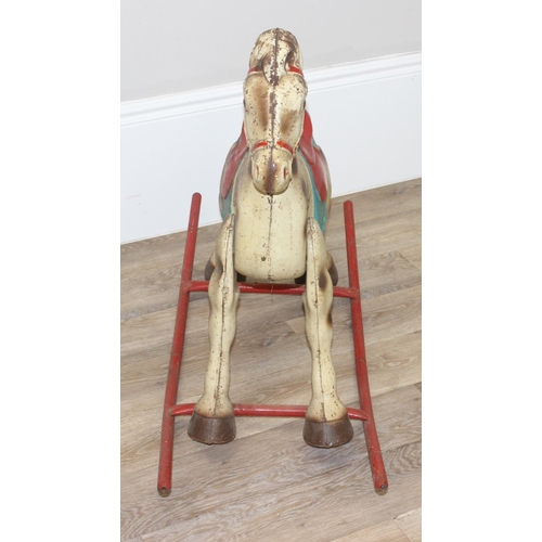 684 - A vintage metal rocking horse, likely by MOBO but seemingly unmarked, approx 80cm tall