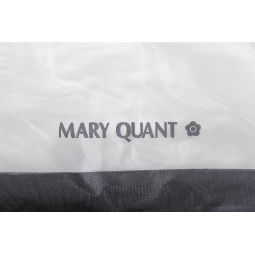 213 - A vintage Mary Quant waterproof poncho or cape, A vintage double-breasted sheepskin coat, label for ... 