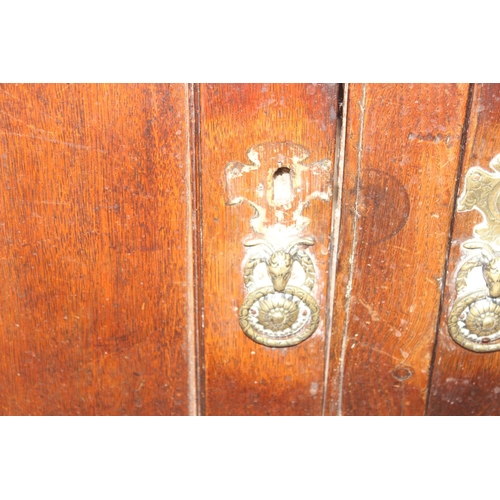 54 - An antique country oak dresser, likely 18th century, the base comprising of 3 cupboards under 3 draw... 