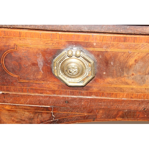 85 - A Georgian mahogany bow front sideboard, with frieze drawer flanked by a cupboard and a cellarette d... 