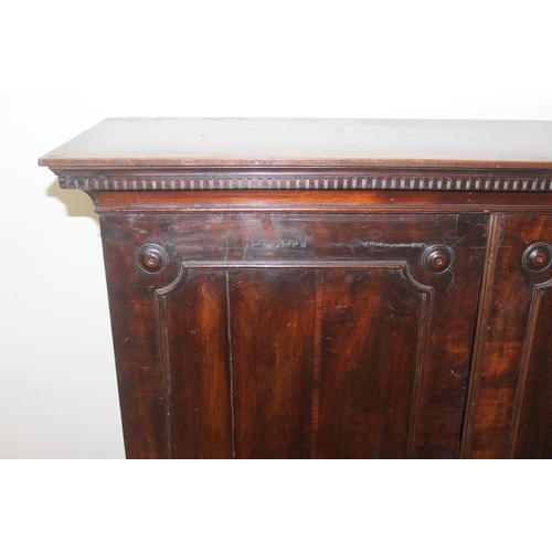 22 - A Georgian mahogany hall cupboard on stand, 2 large doors concealing 4 adjustable shelves, approx 11... 