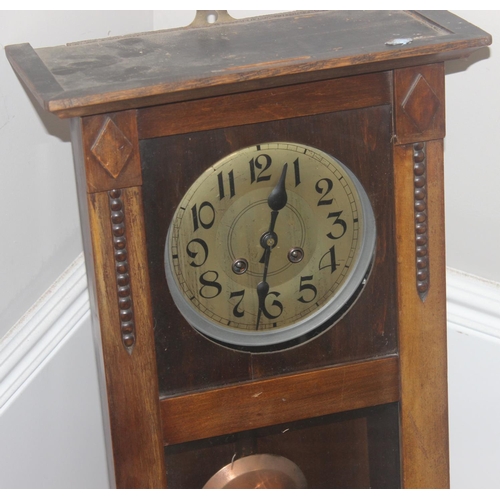 1322 - Vintage oak cased mechanical wall clock with bevelled glass panels, approx 60cm