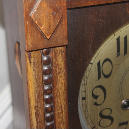 1322 - Vintage oak cased mechanical wall clock with bevelled glass panels, approx 60cm