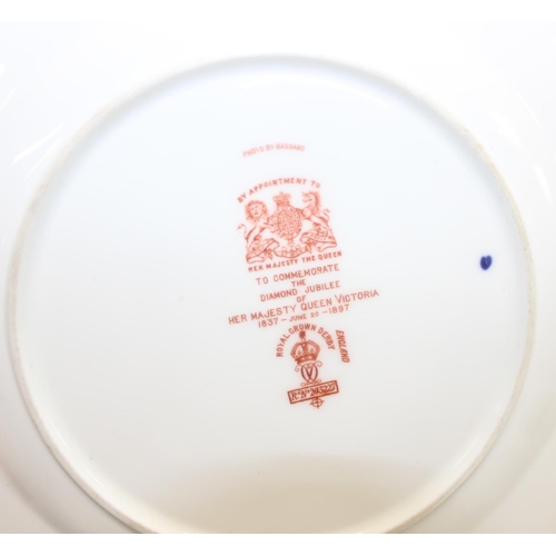 1695 - A Royal Crown Derby Queen Victoria diamond jubilee plate and a rare 19th century lancers pottery pla... 