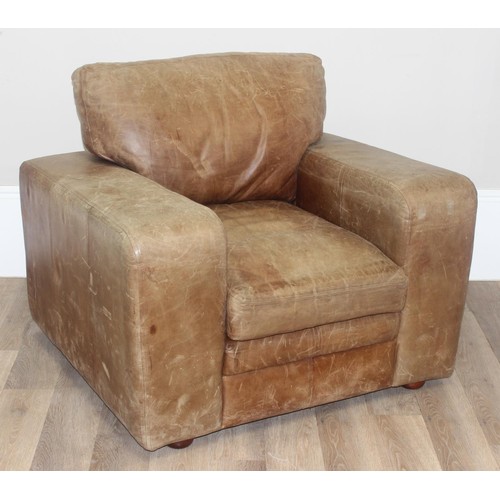 37 - A good quality modern brown suede leather sofa and a number of decorative cushions, approx 222cm wid... 