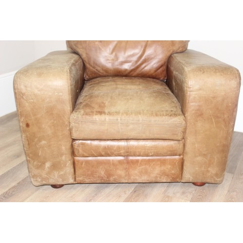 37 - A good quality modern brown suede leather sofa and a number of decorative cushions, approx 222cm wid... 