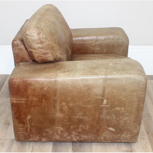 37 - A good quality modern brown suede leather sofa and a number of decorative cushions, approx 222cm wid... 