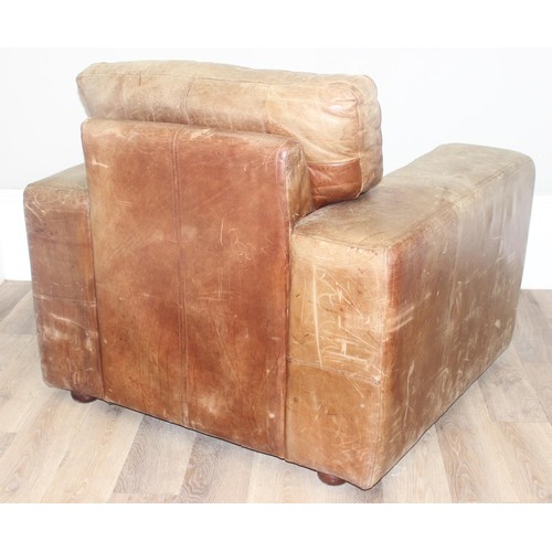 37 - A good quality modern brown suede leather sofa and a number of decorative cushions, approx 222cm wid... 