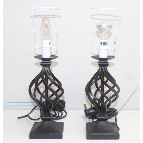 255 - 3 pairs of metal table lamps to include a pair of distressed metal effect table lamps formed as ioni... 