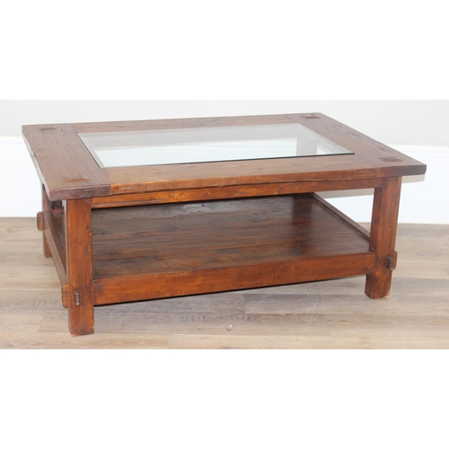 34 - A vintage reclaimed hard wood coffee table with glass central panel, approx 120cm wide x 90cm deep x... 