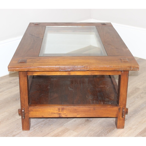 34 - A vintage reclaimed hard wood coffee table with glass central panel, approx 120cm wide x 90cm deep x... 