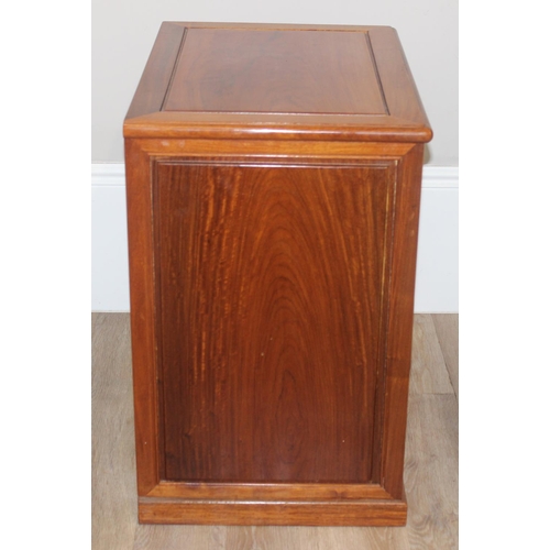 52 - A 20th century Oriental hardwood side cabinet with 2 drawers and a glazed fold down cabinet to top, ... 