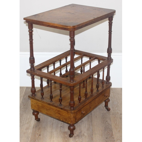 55 - A 19th century walnut canterbury whatnot with turned spindle supports, the canterbury with three sec... 