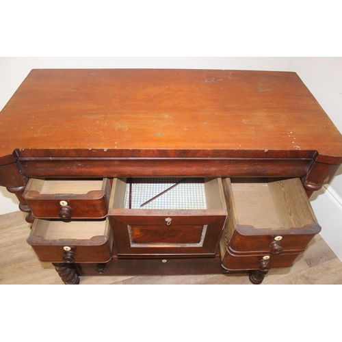 58 - A Victorian mahogany Scottish chest of drawers, a secret top drawer over 2 banks of 2 short drawers ... 