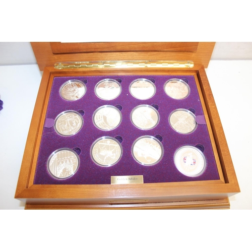 1219 - An Elizabeth II 2002 Golden Jubilee Silver Coin Collection, including twenty-four various commemorat... 