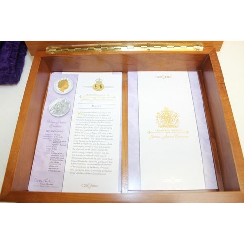 1219 - An Elizabeth II 2002 Golden Jubilee Silver Coin Collection, including twenty-four various commemorat... 