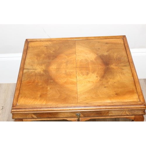 107 - A Queen Anne style walnut low table with cabriole legs and small single drawer, approx 70cm wide x 5... 