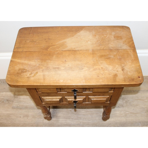 161 - Antique style stained beech bedside table with 2 drawers and iron drop handles, approx 62cm x 37cm x... 