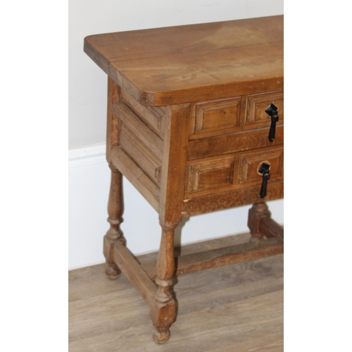 161 - Antique style stained beech bedside table with 2 drawers and iron drop handles, approx 62cm x 37cm x... 