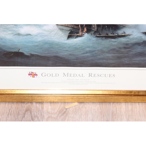 495 - 3 framed RNLI prints of Gold Medal Rescues, to incl Jersey, Isle of Man and Isles of Scilly, all sig... 