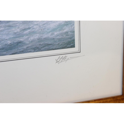 495 - 3 framed RNLI prints of Gold Medal Rescues, to incl Jersey, Isle of Man and Isles of Scilly, all sig... 